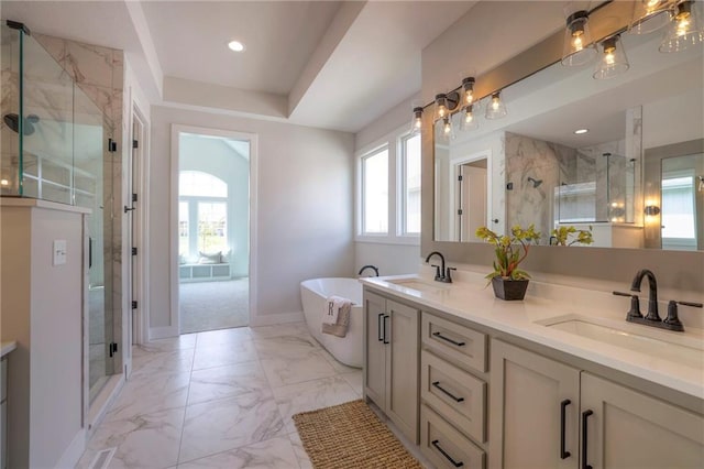 bathroom featuring vanity and plus walk in shower