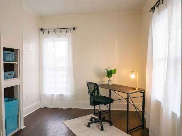 home office with dark wood-type flooring