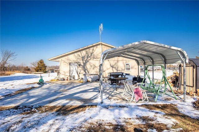 exterior space featuring a carport