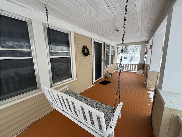 wooden deck with a porch