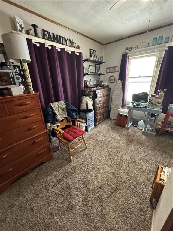 bedroom with carpet, a textured ceiling, and ornamental molding