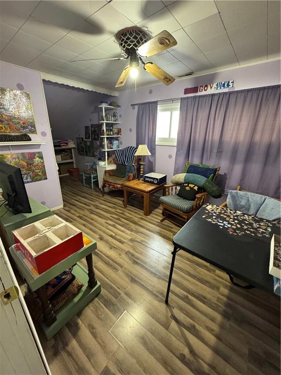 playroom featuring hardwood / wood-style floors and ceiling fan