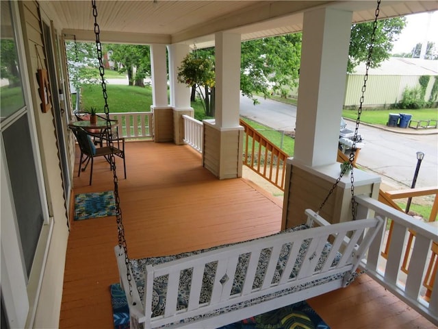 wooden deck with a porch