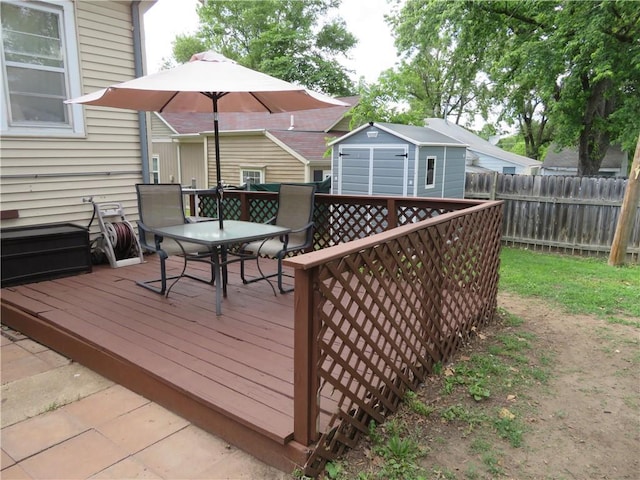 wooden deck with a storage unit