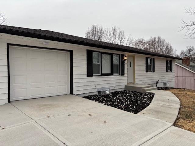 single story home with a garage