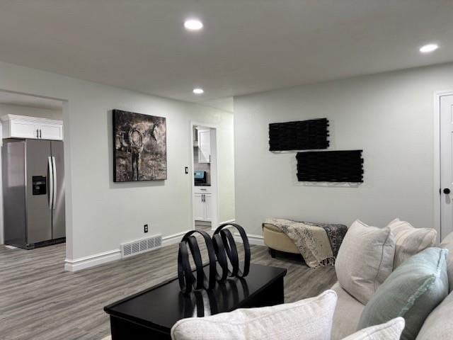 living room with hardwood / wood-style flooring