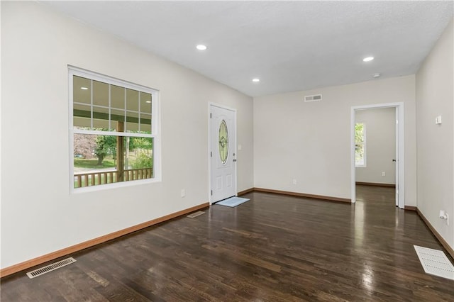 foyer featuring dark hardwood / wood-style floors