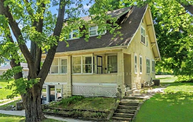 view of front of property with central AC