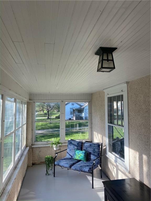 sunroom with wood ceiling