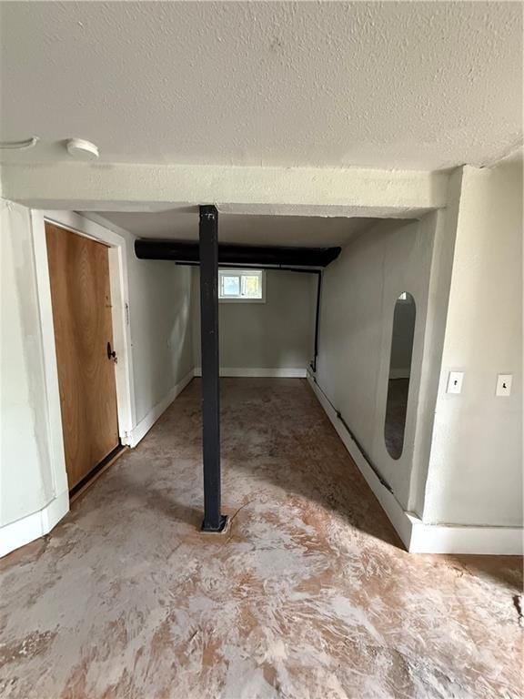 211 N Mulberry St, Maryville, MO 64468 - basement with a textured ceiling