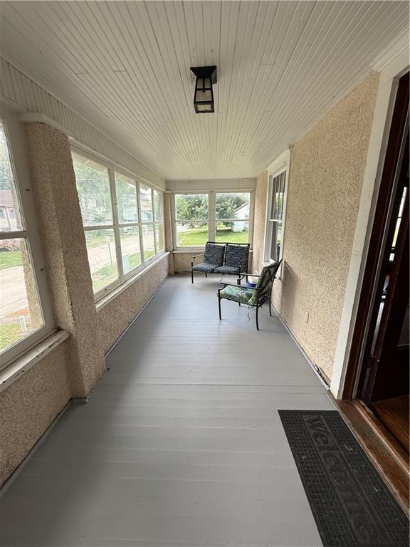 211 N Mulberry St, Maryville, MO 64468 - sunroom / solarium featuring plenty of natural light
