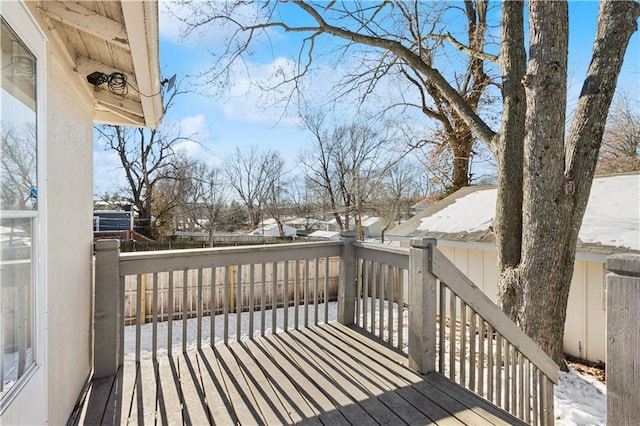 view of snow covered deck