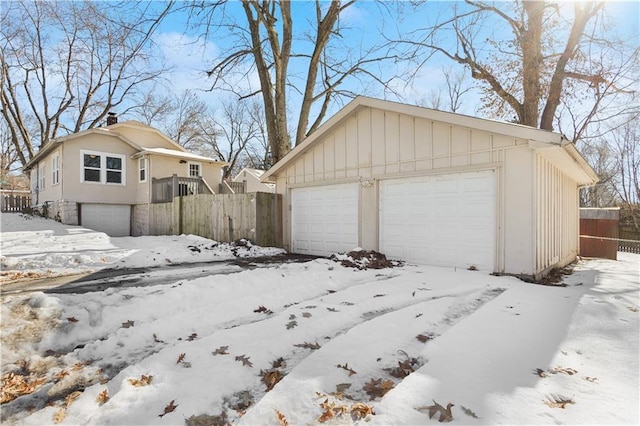 view of snow covered garage