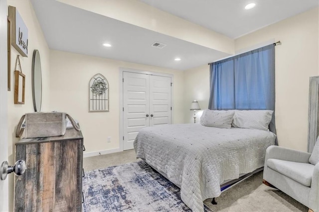 bedroom featuring a closet and carpet