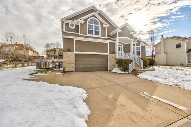 view of front of property with a garage