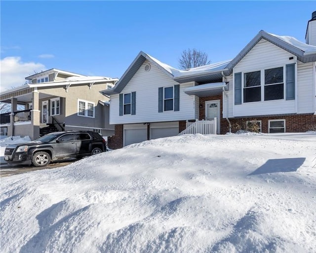 split foyer home featuring a garage