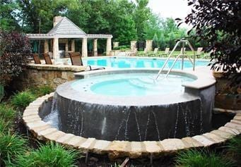 view of pool featuring a gazebo