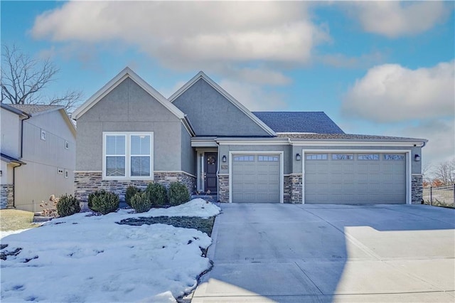 view of front of property with a garage