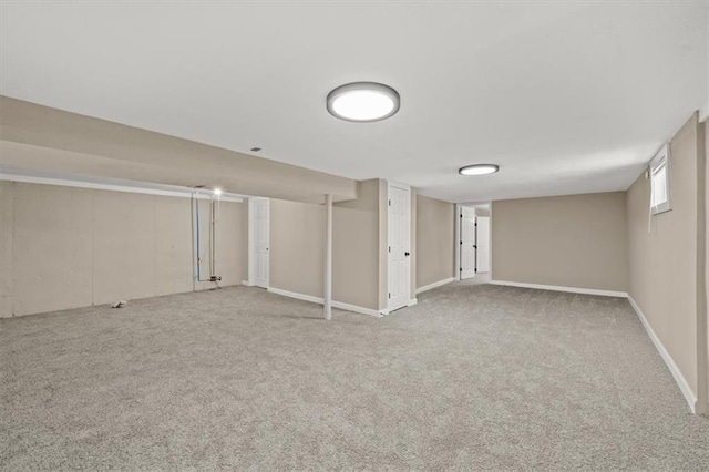 basement with carpet flooring