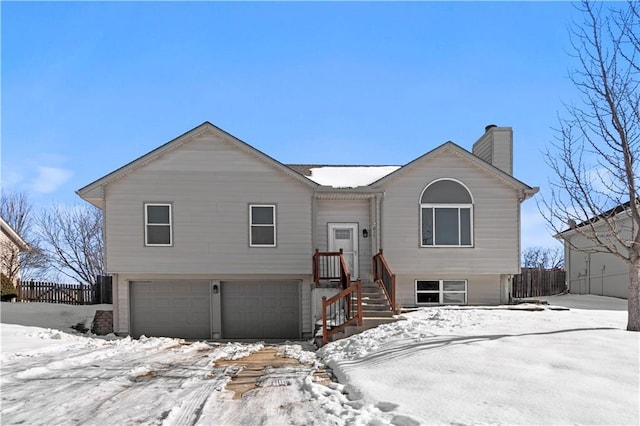 view of front of home with a garage