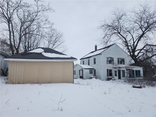 view of snow covered property