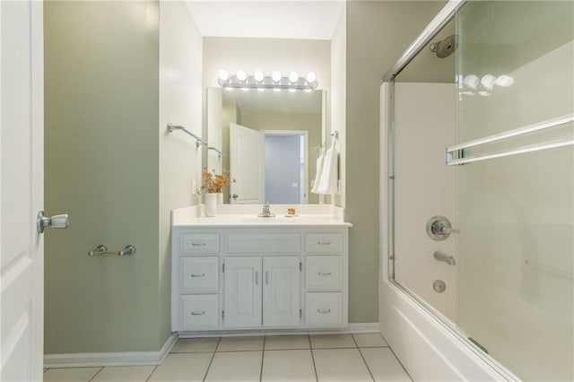 bathroom featuring shower / bath combination with glass door, tile patterned floors, and vanity