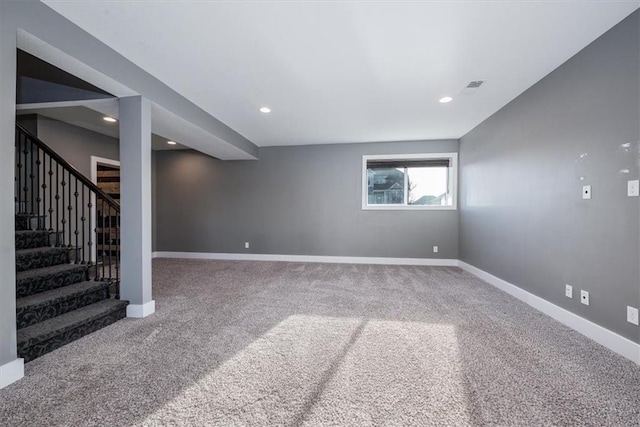 basement featuring carpet flooring