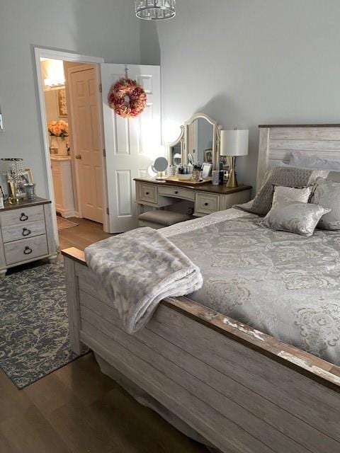 bedroom with wood-type flooring