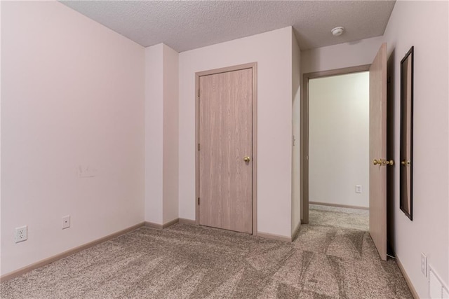 interior space featuring a textured ceiling