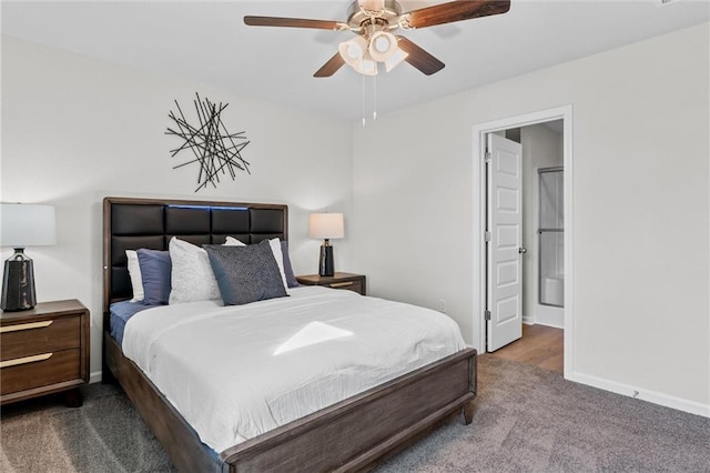 carpeted bedroom with ceiling fan and connected bathroom