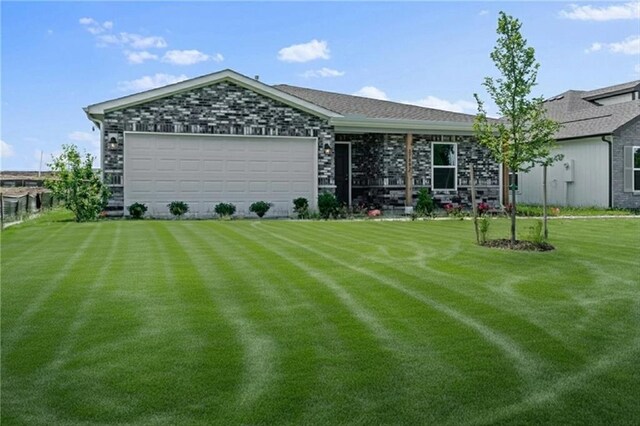37887 W 207th Ter, Edgerton, KS 66021 - view of front of property with a front yard and an attached garage