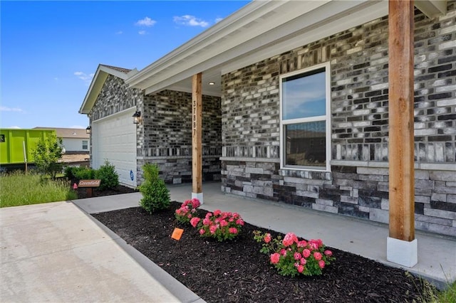 37887 W 207th Ter, Edgerton, KS 66021 - porch with an attached garage