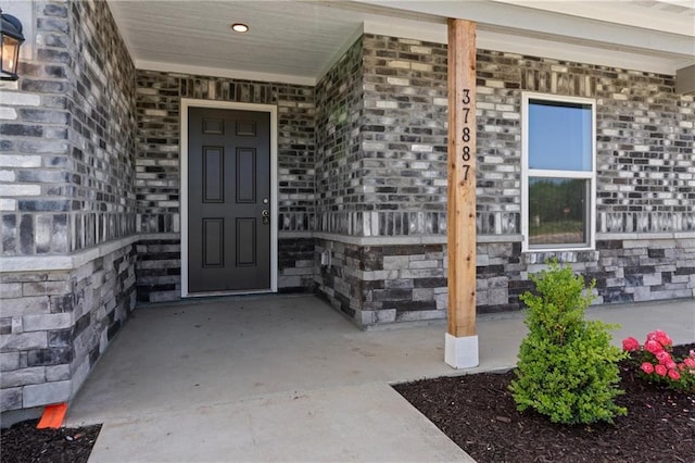 37887 W 207th Ter, Edgerton, KS 66021 - property entrance featuring a porch