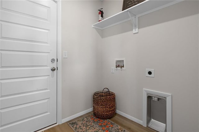37767 W 207th Ter, Edgerton, KS 66021 - washroom featuring washer hookup, electric dryer hookup, and wood finished floors