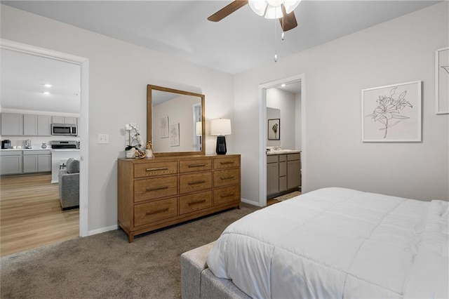 37767 W 207th Ter, Edgerton, KS 66021 - carpeted bedroom featuring ensuite bath and a ceiling fan
