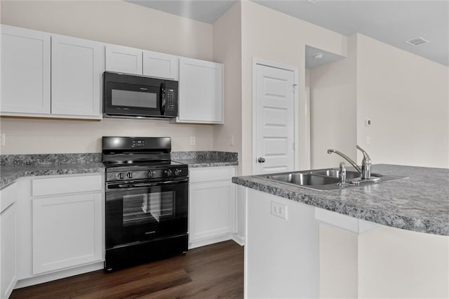 kitchen featuring black appliances, white cabinets, dark hardwood / wood-style floors, and sink