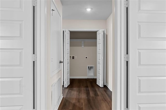 hall with dark wood-type flooring