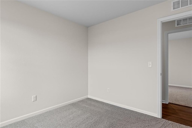 unfurnished room featuring carpet floors