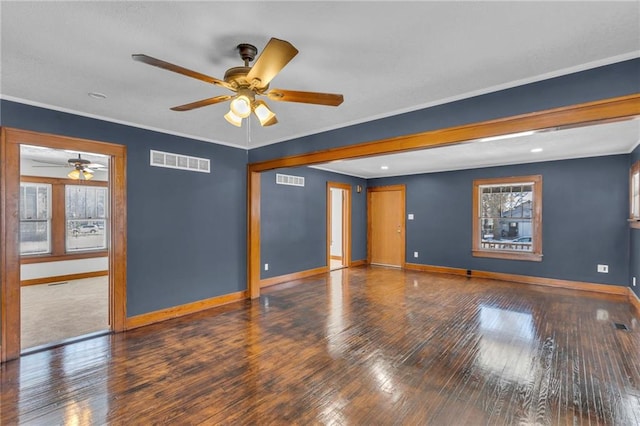 unfurnished room with ceiling fan, a healthy amount of sunlight, and crown molding