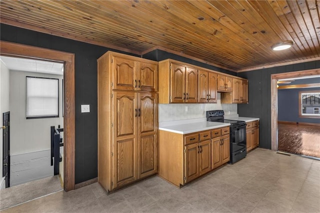 kitchen with wooden ceiling, backsplash, and black range with electric stovetop