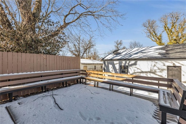 view of snow covered deck