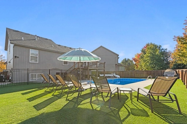 exterior space featuring a fenced in pool