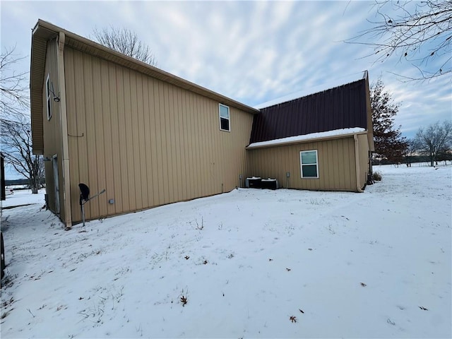 view of snow covered house