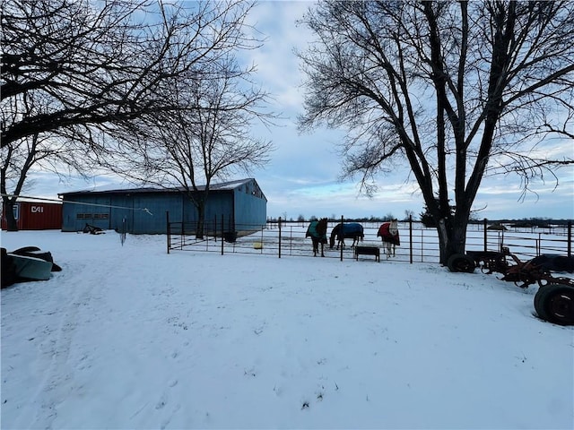 view of yard layered in snow