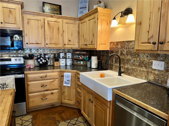 kitchen with black appliances, backsplash, sink, and wood counters