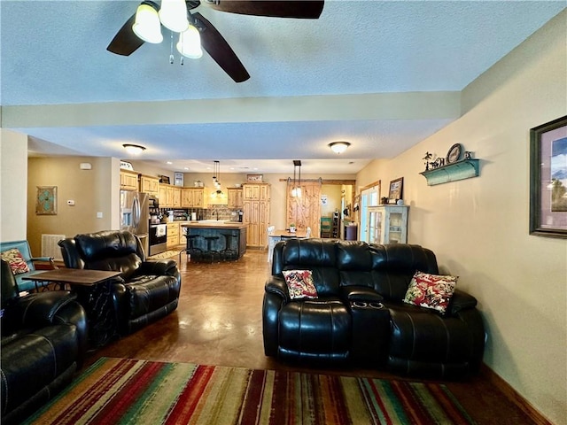 living room with ceiling fan