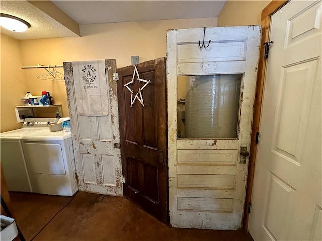 washroom featuring washer and clothes dryer