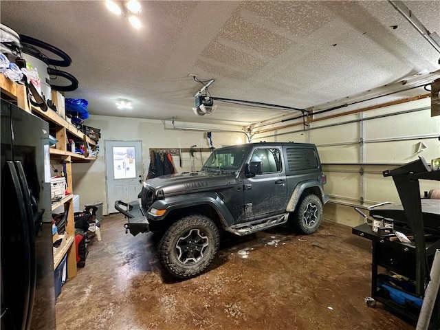 garage featuring a garage door opener