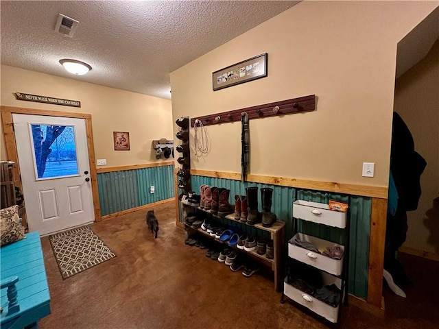 interior space with a textured ceiling