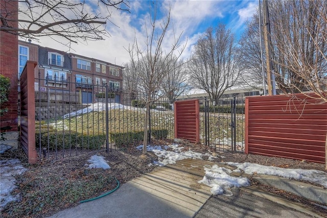 view of snow covered gate